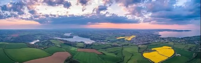 Framed Print : Sunset over Rapeseed fields and Farmlands from a drone, Paignton and Brixham, River Dart, Devon, England Framed Print : Sunset over Rapeseed fields and Farmlands from a drone, Paignton and Brixham, River Dart, Devon, England