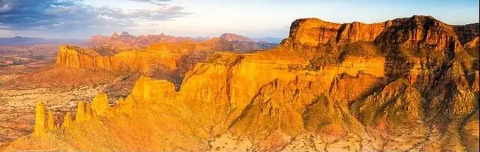 Framed Print : Sunset over red rocks of Gheralta Mountains, aerial view by drone, Hawzen, Tigray Region, Ethiopia, Africa Framed Print : Sunset over red rocks of Gheralta Mountains, aerial view by drone, Hawzen, Tigray Region, Ethiopia, Africa