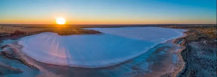 Framed Print : Sunset over salt lake in the desert - wide aerial panoramic landscape Framed Print : Sunset over salt lake in the desert - wide aerial panoramic landscape