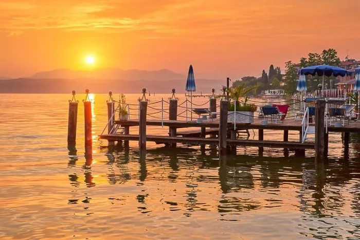 Framed Print : Sunset view at Garda Lake, Sirmione, Lombardy, Italy Framed Print : Sunset view at Garda Lake, Sirmione, Lombardy, Italy