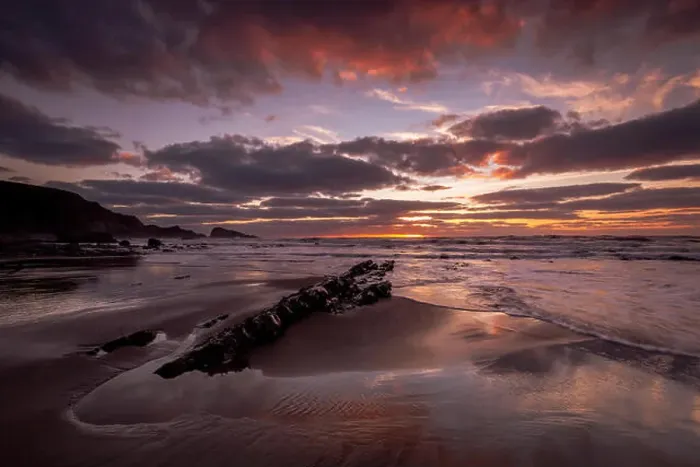 Framed Print : Sunset at Welcombe Mouth Beach in North Devon, UK. There is a beautiful orange sky, pristine sands and nice clouds Framed Print : Sunset at Welcombe Mouth Beach in North Devon, UK. There is a beautiful orange sky, pristine sands and nice clouds