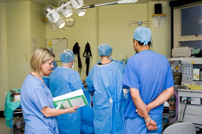 Framed Print : Surgeons in surgery room Framed Print : Surgeons in surgery room