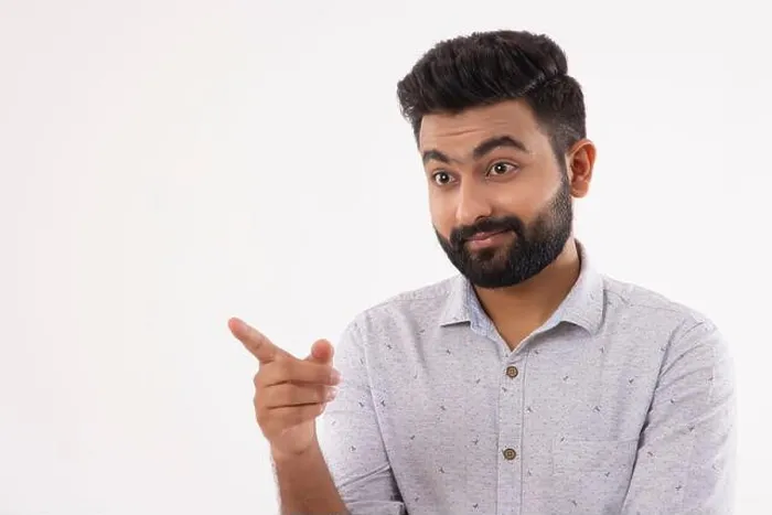 Framed Print : A SURPRISED BEARDED MAN POINTING HIS FINGER AWAY Framed Print : A SURPRISED BEARDED MAN POINTING HIS FINGER AWAY