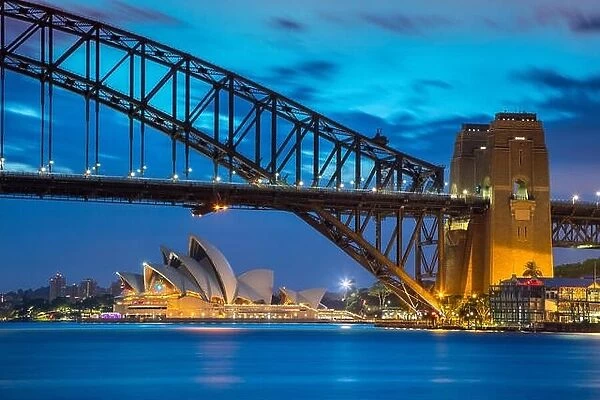 Sydney. Cityscape image of Sydney Opera House, Australia with Harbour Bridge and Sydney skyline during sunset