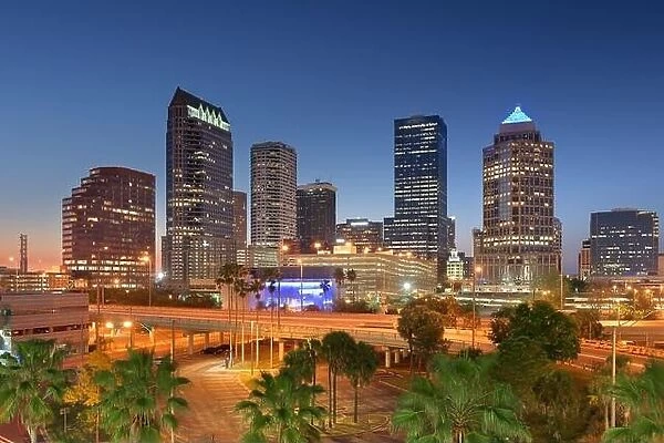 Tampa, Florida, USA downtown city skyline over roads and highways at dusk