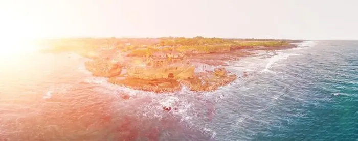 Framed Print : Tanah Lot - Temple in the Ocean. Bali, Indonesia. Photo from the drone. Banner, Long format Framed Print : Tanah Lot - Temple in the Ocean. Bali, Indonesia. Photo from the drone. Banner, Long format