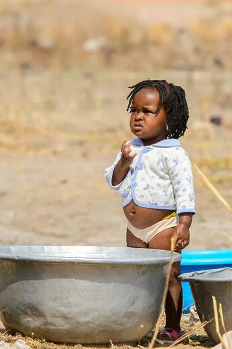 Framed Print : TECHIMAN, GHANA - JAN 15, 2017: Unidentified Ghanaian beautiful little girl near a basin on the Washing Day Framed Print : TECHIMAN, GHANA - JAN 15, 2017: Unidentified Ghanaian beautiful little girl near a basin on the Washing Day