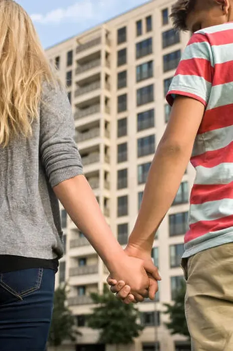 Framed Print : Teenage couple holding hands, close up Framed Print : Teenage couple holding hands, close up