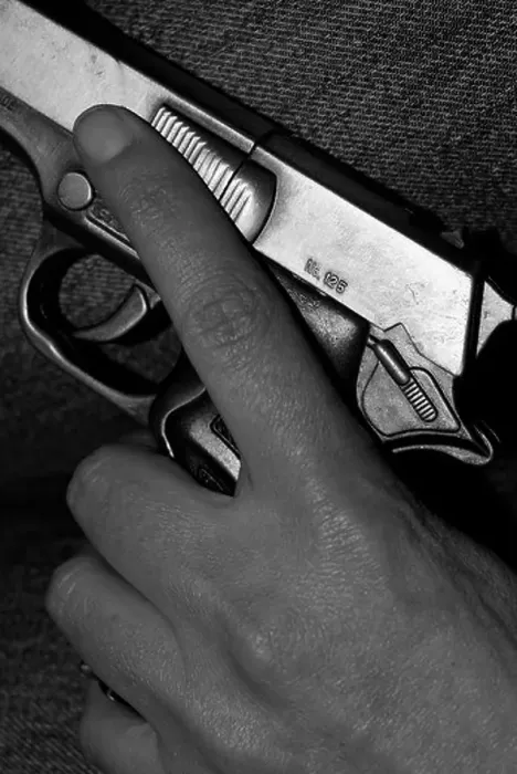 Framed Print : Teenage Hand holding a Hand Gun Framed Print : Teenage Hand holding a Hand Gun
