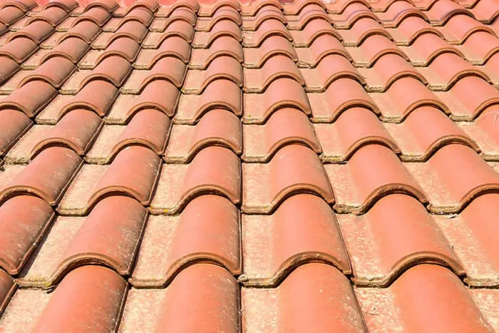 Framed Print : Terracotta roof tiles on the roof of a building Framed Print : Terracotta roof tiles on the roof of a building