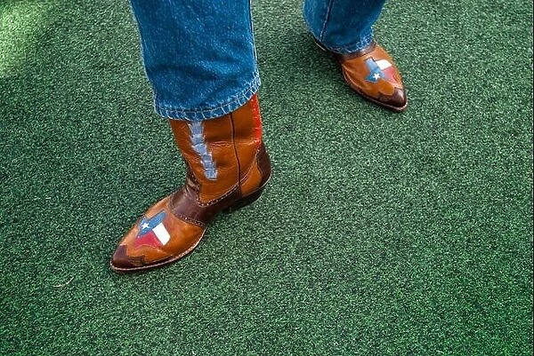 A Texan displays his pride of the lone star state with his custom cowboy boots