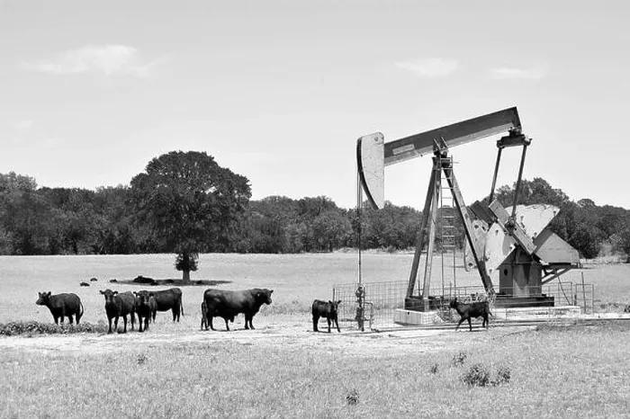 Framed Print : Texas oil well pumper in black and white with room for your type Framed Print : Texas oil well pumper in black and white with room for your type