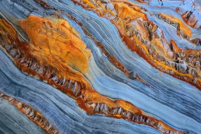 Framed Print : Texture patterns and colors on a cliff of a beach in Asturias