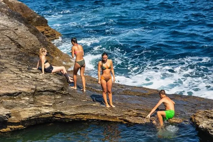 Framed Print : Thassos, Greece - July 20, 2019: Tourists are doing diving in the natural swimming pool Giola in Thassos island, Greece Framed Print : Thassos, Greece - July 20, 2019: Tourists are doing diving in the natural swimming pool Giola in Thassos island, Greece
