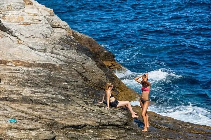 Framed Print : Thassos, Greece - July 20, 2019: Tourists are doing diving in the natural swimming pool Giola in Thassos island, Greece Framed Print : Thassos, Greece - July 20, 2019: Tourists are doing diving in the natural swimming pool Giola in Thassos island, Greece