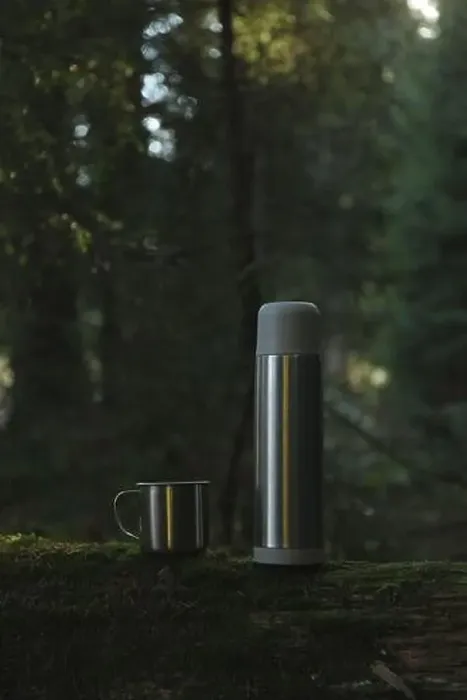 Framed Print : Thermos and cup on log in forest Framed Print : Thermos and cup on log in forest