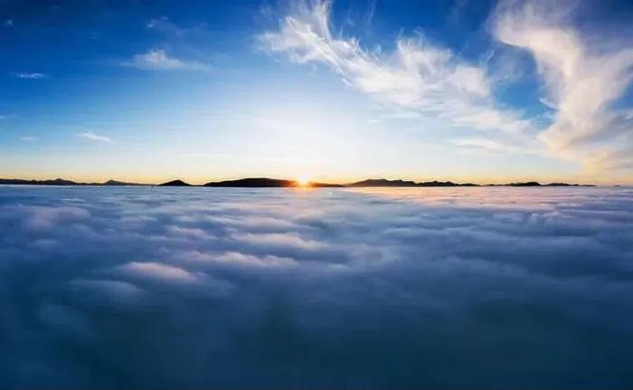 Framed Print : Thick clouds over the mountains at dawn from aerial view Framed Print : Thick clouds over the mountains at dawn from aerial view