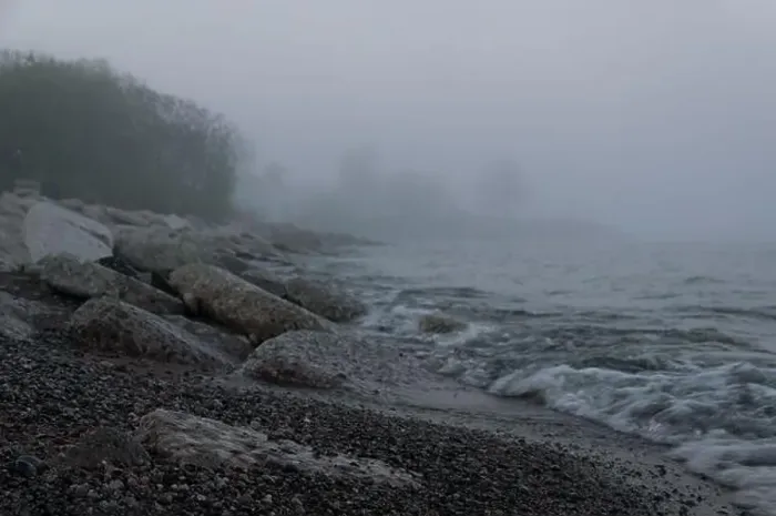 Framed Print : Thick fog on the shore of Lake Ontario in Toronto's Trillium Park with huge boulders in the foreground Framed Print : Thick fog on the shore of Lake Ontario in Toronto's Trillium Park with huge boulders in the foreground