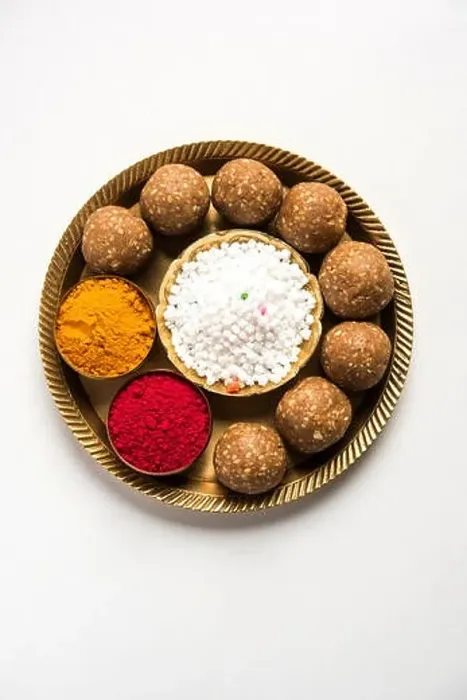 Framed Print : Tilgul or Til Gul with haldi Kumkum and halwa / chiranji or sugar balls for makar sankranti festival Framed Print : Tilgul or Til Gul with haldi Kumkum and halwa / chiranji or sugar balls for makar sankranti festival