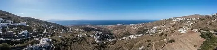 Framed Print : Tinos island, Cyclades Greece. Aerial panoramic view. Small villages with white houses on rocky land, blue sea and sky Framed Print : Tinos island, Cyclades Greece. Aerial panoramic view. Small villages with white houses on rocky land, blue sea and sky