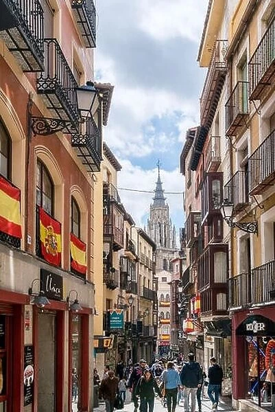Toledo, Spain - April 15, 2018 : Many tourist sightseeing ancient city Toledo in Castilla la Mancha with Santa Iglesia Catedral