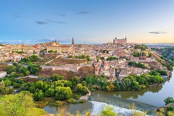 Toledo, Spain old town city skyline atr dawn