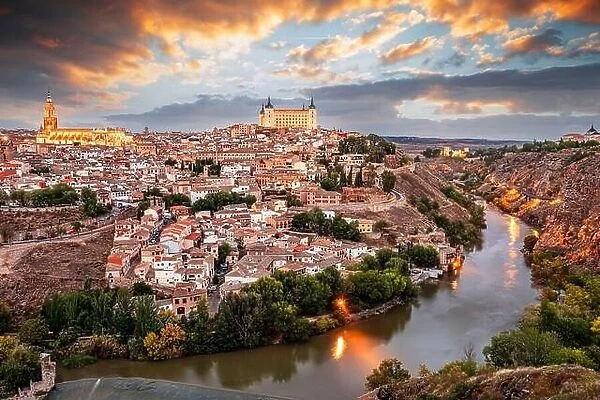 Toledo, Spain old town on the river at dusk