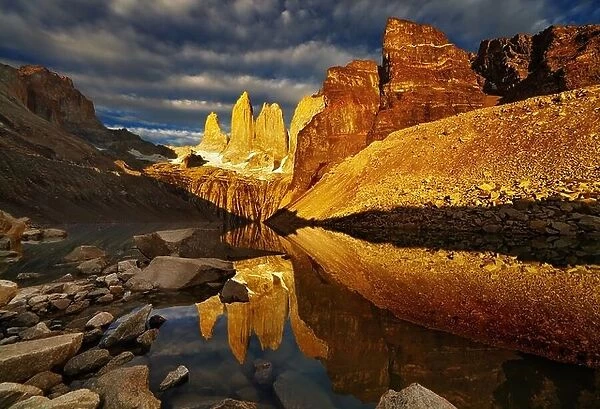 Towers with reflection at sunrise, Torres del Paine National Park, Patagonia, Chile