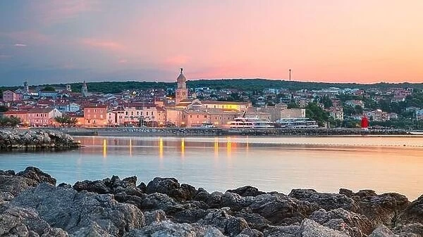 Town of Krk, Croatia. Panoramic cityscape image of Krk, Croatia located on Krk Island with the Krk Cathedral at summer sunrise