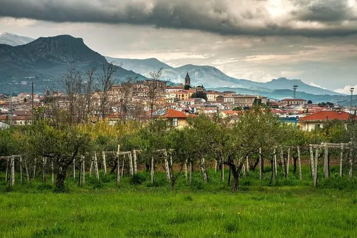 Framed Print : the town of Tocco da Casauria immersed in the countryside and in the rows of vines Framed Print : the town of Tocco da Casauria immersed in the countryside and in the rows of vines