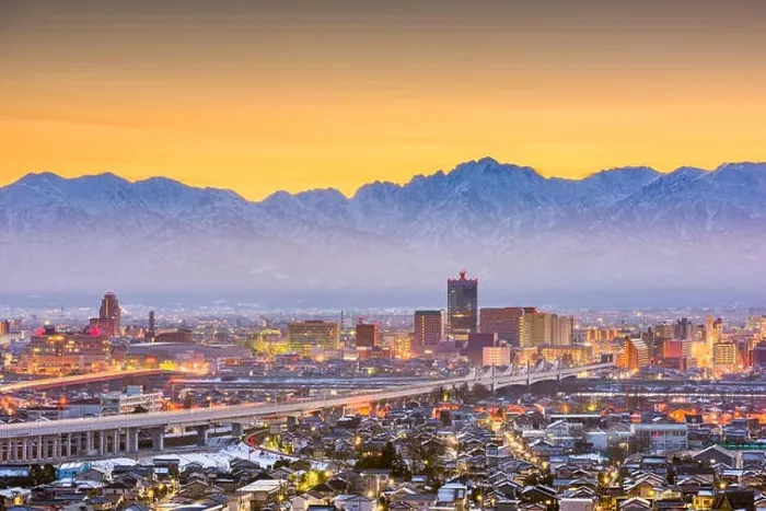 Framed Print : Toyama, Japan downtown city skyline with Tateyama Mountain at dawn Framed Print : Toyama, Japan downtown city skyline with Tateyama Mountain at dawn