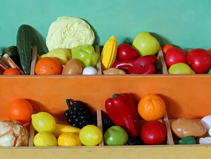 Framed Print : toys to play with plastic fruit to fruit and vegetable market for children