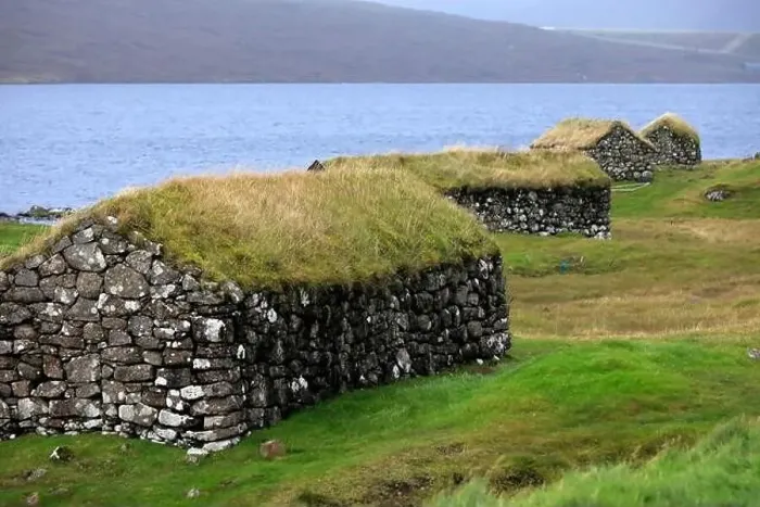 Framed Print : Traditional houses in a scenic landscape, Faroe islands Framed Print : Traditional houses in a scenic landscape, Faroe islands