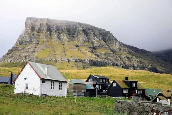 Framed Print : Traditional houses in a scenic landscape, Faroe islands Framed Print : Traditional houses in a scenic landscape, Faroe islands