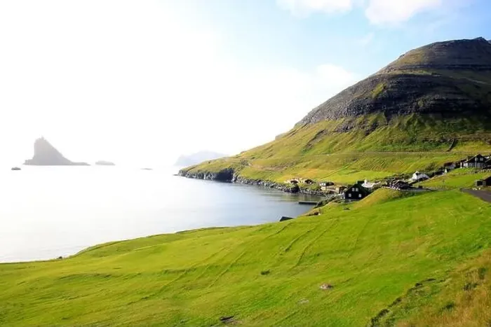 Framed Print : Traditional houses in a scenic landscape, Faroe islands Framed Print : Traditional houses in a scenic landscape, Faroe islands