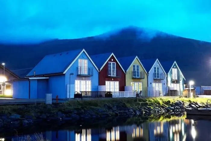Framed Print : Traditional houses in a scenic landscape, Faroe islands