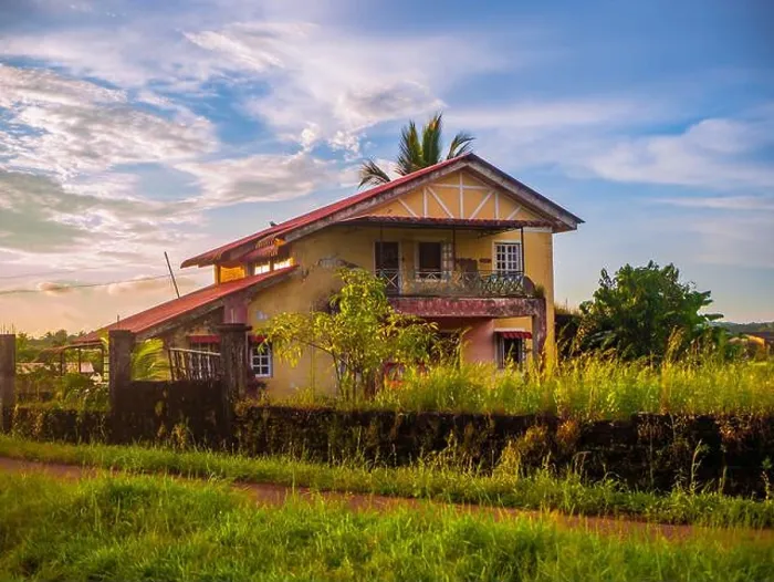 Framed Print : Traditional Indian village house surrounded by green grass and beatiful sunset sky. Village landscape Framed Print : Traditional Indian village house surrounded by green grass and beatiful sunset sky. Village landscape