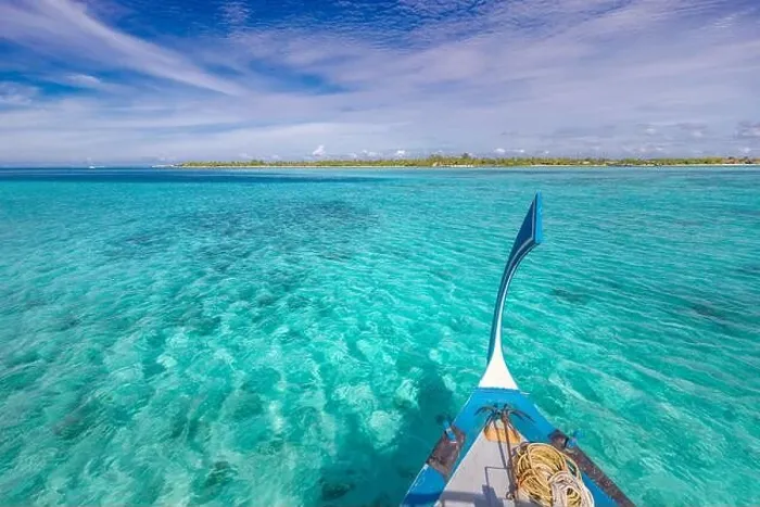 Framed Print : Traditional Maldivian boat Dhoni with amazing tropical island background view. Nature paradise beach, open sea view, seascape in Maldives, luxury Framed Print : Traditional Maldivian boat Dhoni with amazing tropical island background view. Nature paradise beach, open sea view, seascape in Maldives, luxury