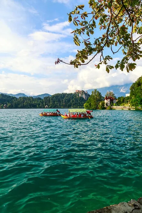 Framed Print : Traditional Pletna boats and tourists in the Lake Bled located in Slovenia -Bled, Slovenia - 27 July, 2014 Framed Print : Traditional Pletna boats and tourists in the Lake Bled located in Slovenia -Bled, Slovenia - 27 July, 2014
