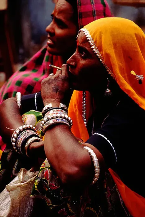 Framed Print : Traditional Rajasthani Woman smoking biddi at Pushkar Mela Rajasthan India Framed Print : Traditional Rajasthani Woman smoking biddi at Pushkar Mela Rajasthan India
