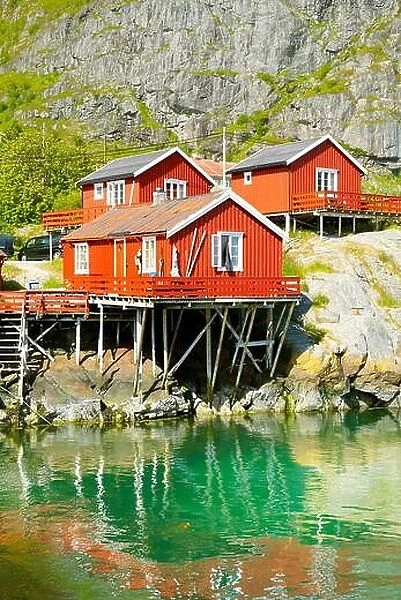 Traditional red wooden rorbu huts on Moskenesoya Island, Lofoten Islands, Norway