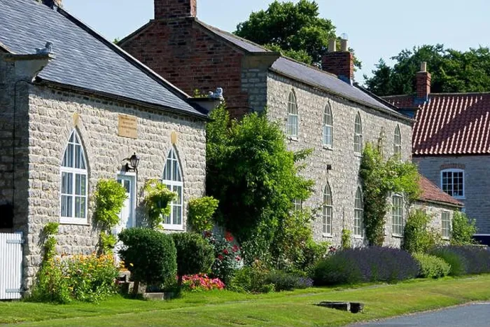 Framed Print : Traditional stone cottages in the village of Langton, near Malton, North Yorkshire, England UK Framed Print : Traditional stone cottages in the village of Langton, near Malton, North Yorkshire, England UK