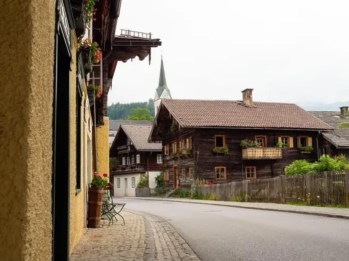 Framed Print : Traditional Timbered Alpine Houses in Center of the Old Village of Goldegg, Pongau Region, Salzburg, Austria Framed Print : Traditional Timbered Alpine Houses in Center of the Old Village of Goldegg, Pongau Region, Salzburg, Austria