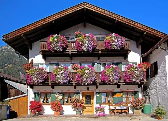 Framed Print : Traditional Upper Bavarian house with flower balconies, Garmisch-Partenkirchen, Werdenfelser Land, Upper Bavaria, Bavaria, Germany Framed Print : Traditional Upper Bavarian house with flower balconies, Garmisch-Partenkirchen, Werdenfelser Land, Upper Bavaria, Bavaria, Germany