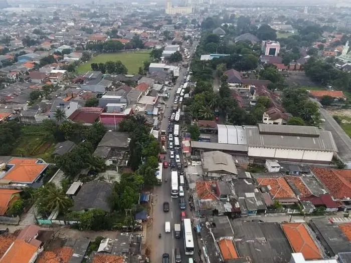 Framed Print : Traffic jam on the polluted streets of Bekasi Framed Print : Traffic jam on the polluted streets of Bekasi