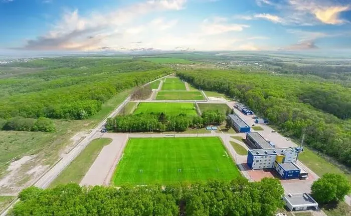 Framed Print : Training soccer fields with green grass in summer forest. View from above Framed Print : Training soccer fields with green grass in summer forest. View from above