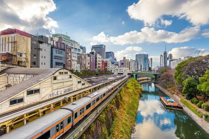 Framed Print : Trains pass by the Kanda River in the Ochanomizu district of Tokyo, Japan Framed Print : Trains pass by the Kanda River in the Ochanomizu district of Tokyo, Japan