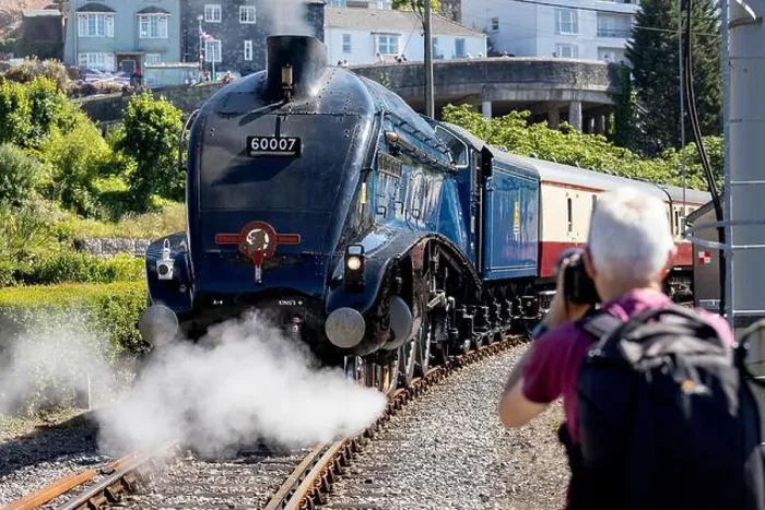 Framed Print : A trainspotter risks all for the perfect picture of the Sir Nigel Gresley LNER A4 number 60007 steam train Framed Print : A trainspotter risks all for the perfect picture of the Sir Nigel Gresley LNER A4 number 60007 steam train