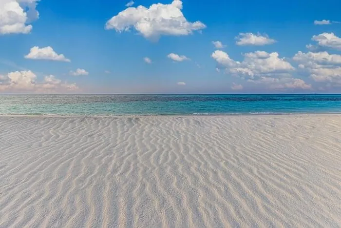 Framed Print : Tranquil beach landscape. Tropical island paradise, shore coast, seaside with cloudy blue sky and soft white sand with ripples. Calm relaxing sea Framed Print : Tranquil beach landscape. Tropical island paradise, shore coast, seaside with cloudy blue sky and soft white sand with ripples. Calm relaxing sea