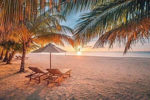 Tranquil beautiful beach. Chairs on the sandy beach near the sea. Summer holiday and vacation concept for tourism. Inspirational tropical landscape